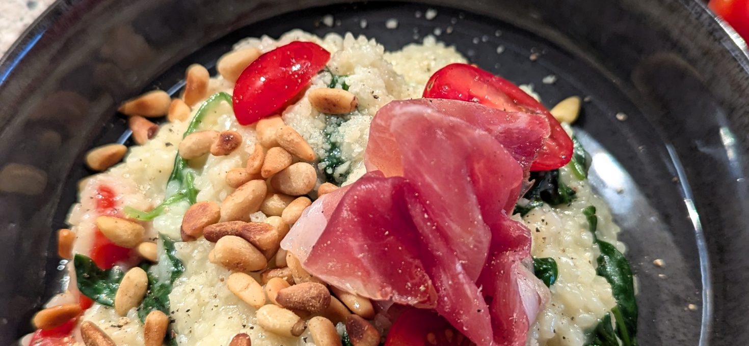 Risotto mit Tomaten und Blattspinat